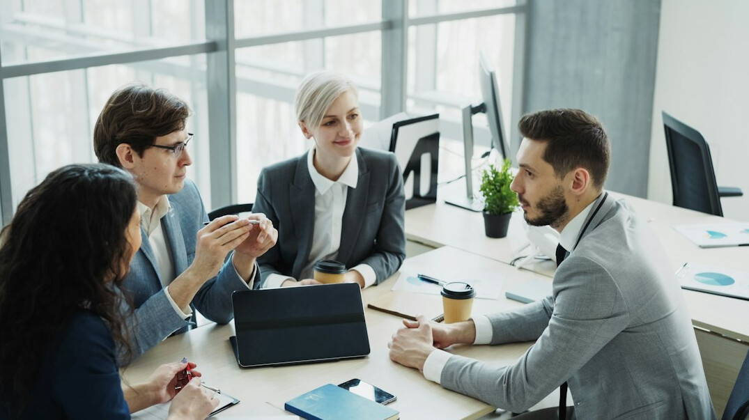 business meeting with insurance executives